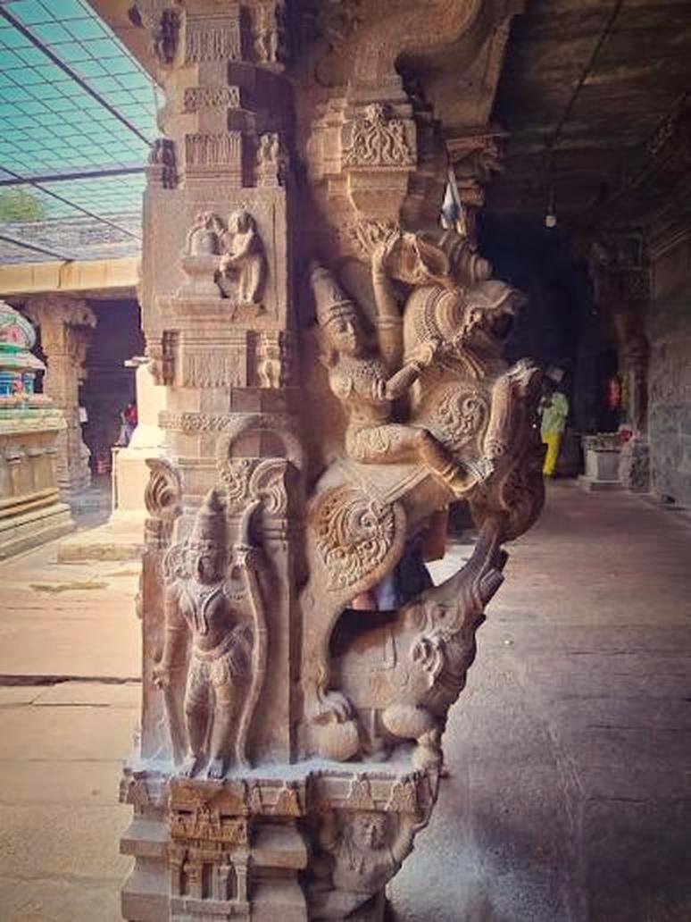 Carved stone pillar inside the Tharamangalam temple